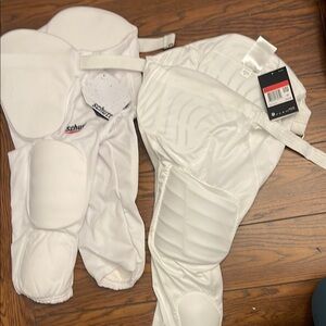 White football Kids pants (Nike and Schutt brand)